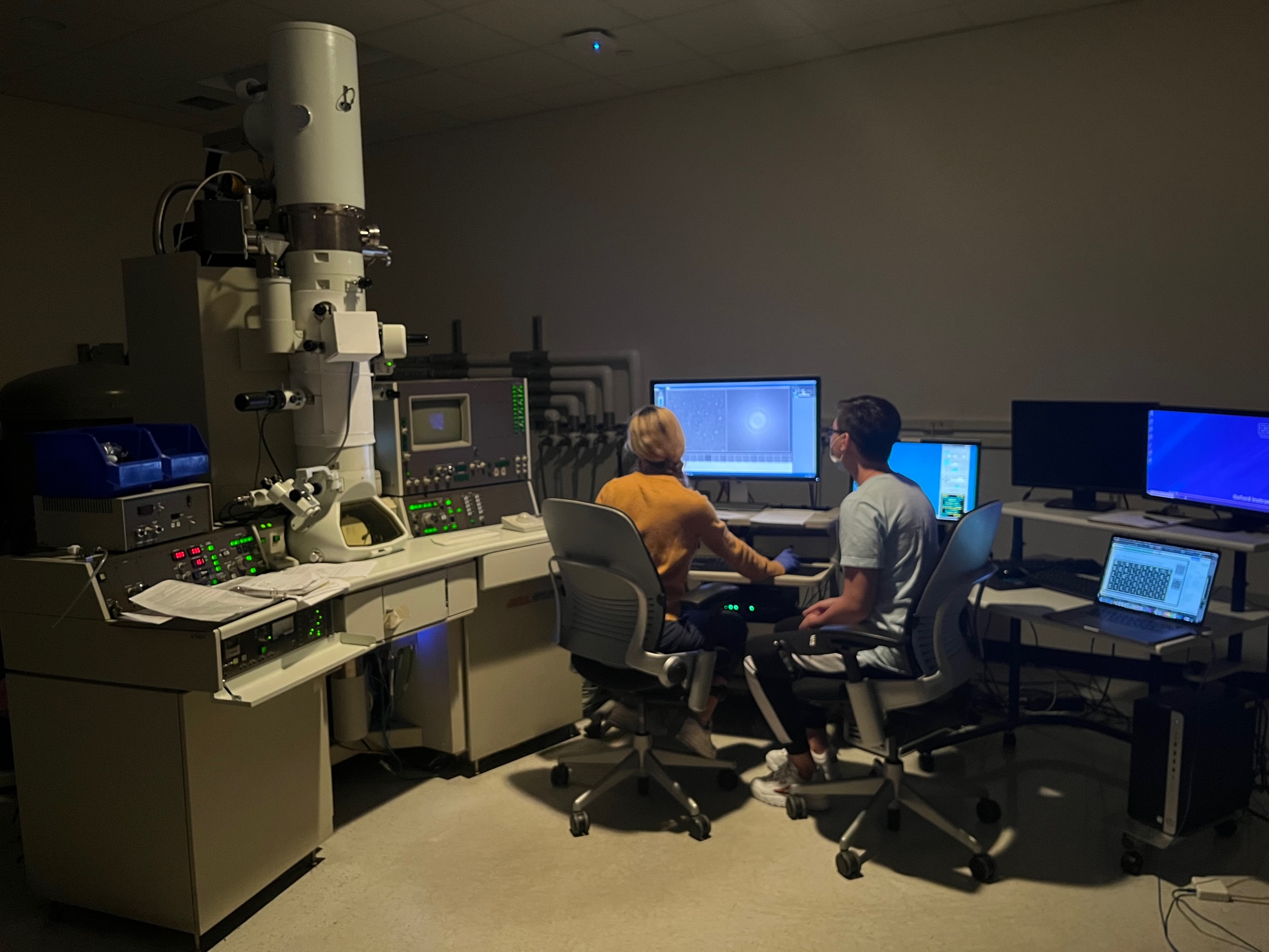 Members of the Marcotte lab use a transmission electron microscope to study protein structures from cilia.