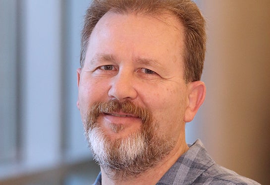 Dr. Andreas Baumler headshot